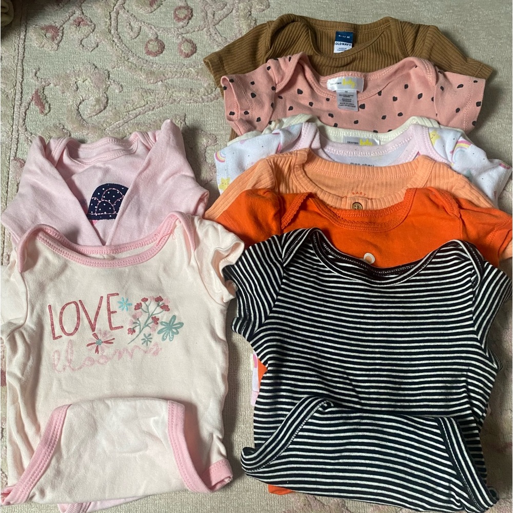 Lot of 9 baby onsies 3-12 months. Assorted brands